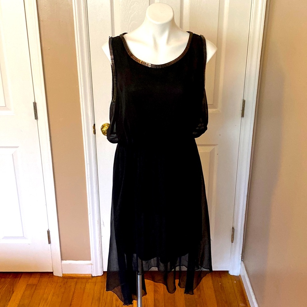 The comfiest black dress with a high/low back train.  Love the metal accent neck